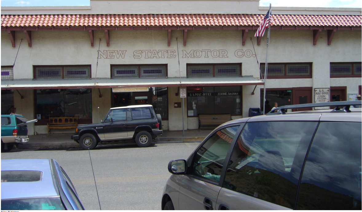 Real-world photograph of the New State Motor Company Building